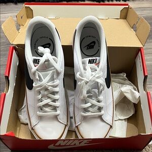 Nike White Sneakers with Black Accents